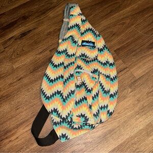 Kavu Chevron Sling Bag in Orange, Yellow, and Black
